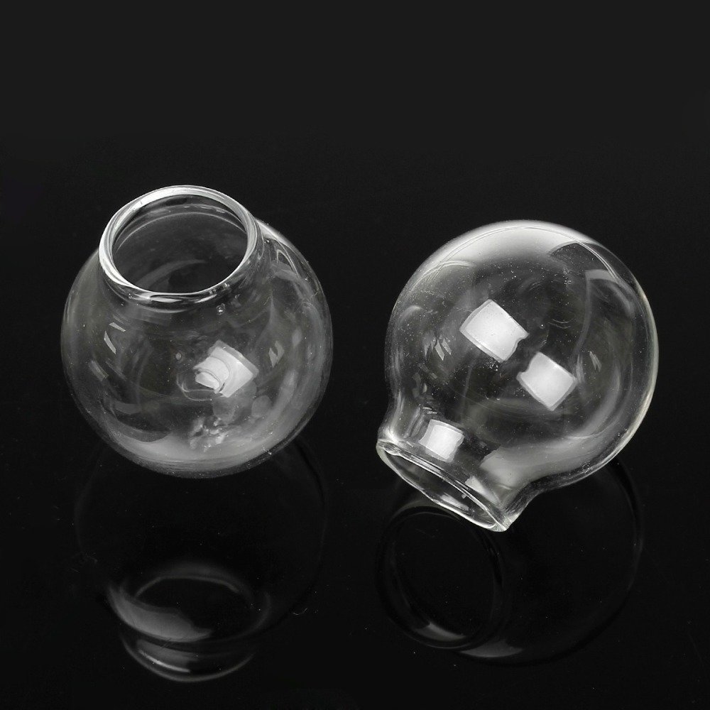 Deux boules en verre transparent de 35 mm à remplir.