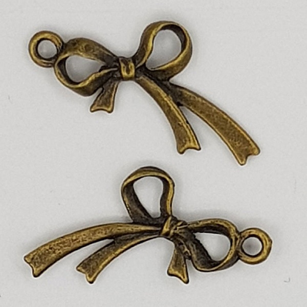 Breloque N&oelig;ud N&deg;07 breloque noeud papillon ruban en m&eacute;tal bronze