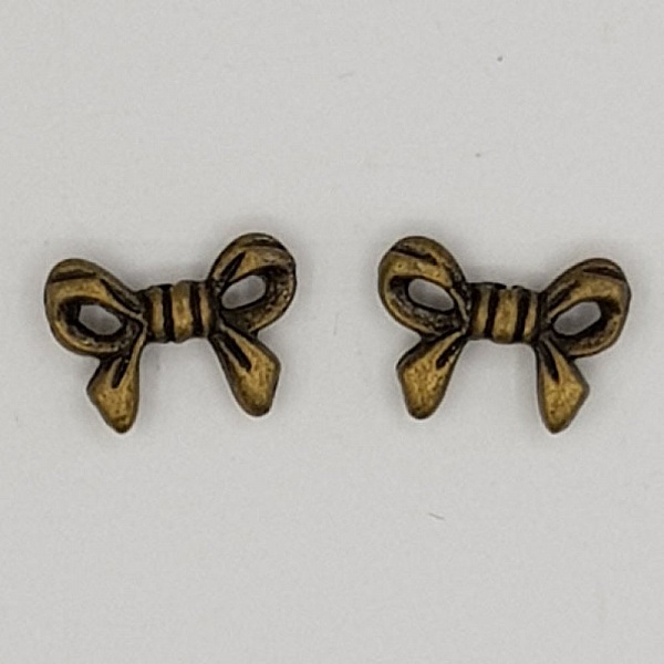 Breloque N&oelig;ud N&deg;11 breloque noeud ruban en m&eacute;tal bronze
