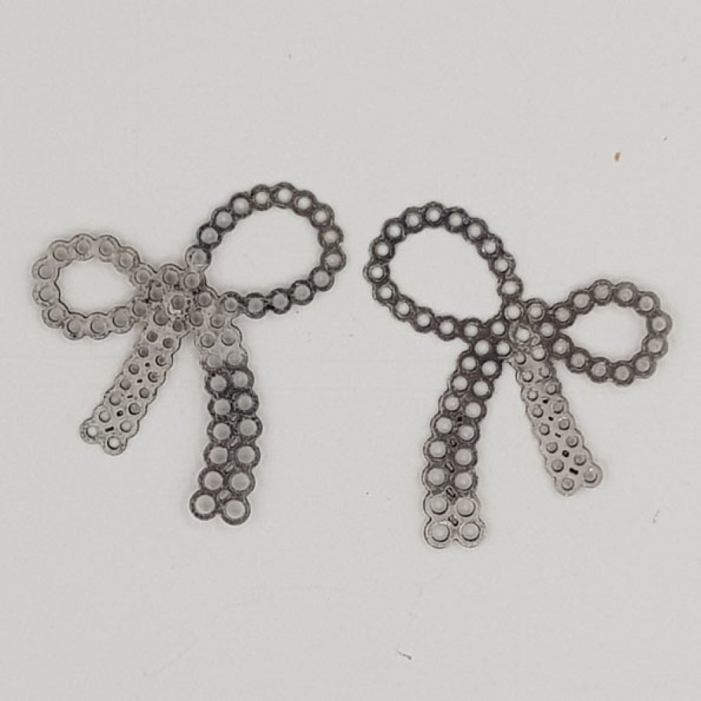 Breloque N&oelig;ud N&deg;24 breloque noeud papillon ruban en m&eacute;tal Argent