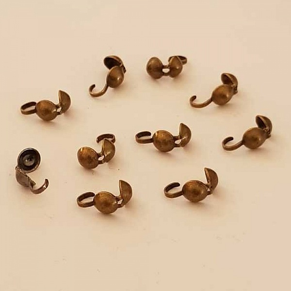Cache n&oelig;ud GM Bronze x 10 pi&egrave;ces