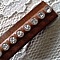 Cuir Bruno de 10 mm Strass Swarovski par 20 cm