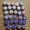 Lot de 25 Perles fleurs N&deg;06