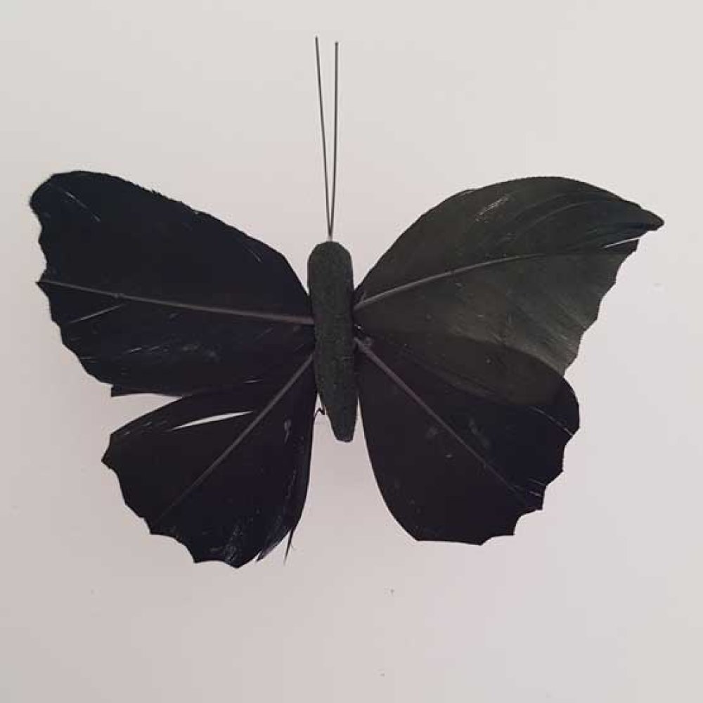 Papillon noir aux ailes de plumes mont&eacute;s sur tige PM