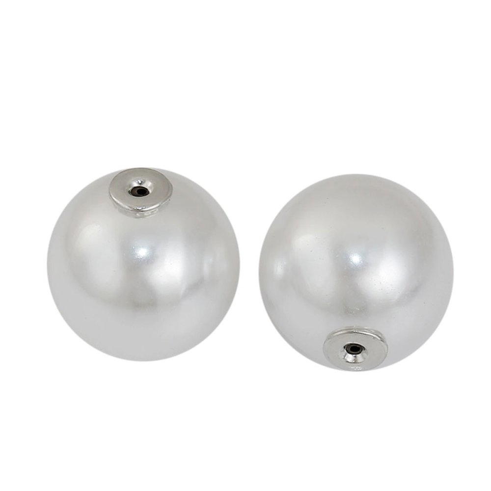 Deux perles blanches 10 mm à trou poussoir.