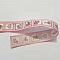Ruban galon rose 25 mm avec motifs pour enfants.