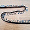 Ruban noir sequin m&eacute;daille perle N&deg;01