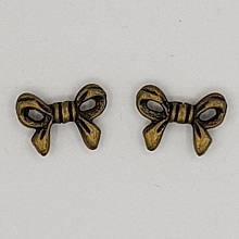 Breloque N&oelig;ud N&deg;11 breloque noeud ruban en m&eacute;tal bronze