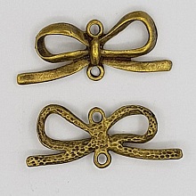 Breloque N&oelig;ud N&deg;16 breloque noeud papillon ruban en m&eacute;tal bronze