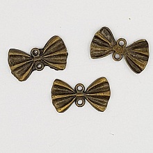 Breloque N&oelig;ud N&deg;22 breloque noeud papillon ruban en m&eacute;tal Bronze