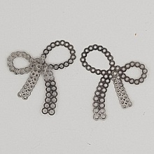 Breloque N&oelig;ud N&deg;24 breloque noeud papillon ruban en m&eacute;tal Argent