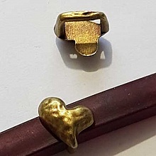 Perle passant coeur pour cuir &eacute;pais r&eacute;galiz 10 mm Bronze N&deg;01