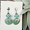 boucles d'oreilles discretes et pastels id&eacute;al pour tenue d'hiver 