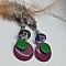 boucles d'oreilles pour oreilles perc&eacute;esvertes et violet couleurs originales et maruage parfait sur des perles en verre