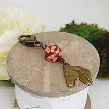 porte cl&eacute;s pendentif tete de cheval couleur bronze et perle orange et marron faite &agrave; la main