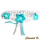 Jarretière de mariée en dentelle blanche et fleurs turquoise.