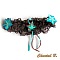 Jarretière de mariage en dentelle chocolat et fleurs turquoise.