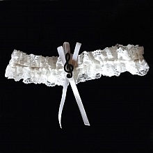 Jarreti&egrave;re mariage cl&eacute; de sol dentelle blanche th&egrave;me musique