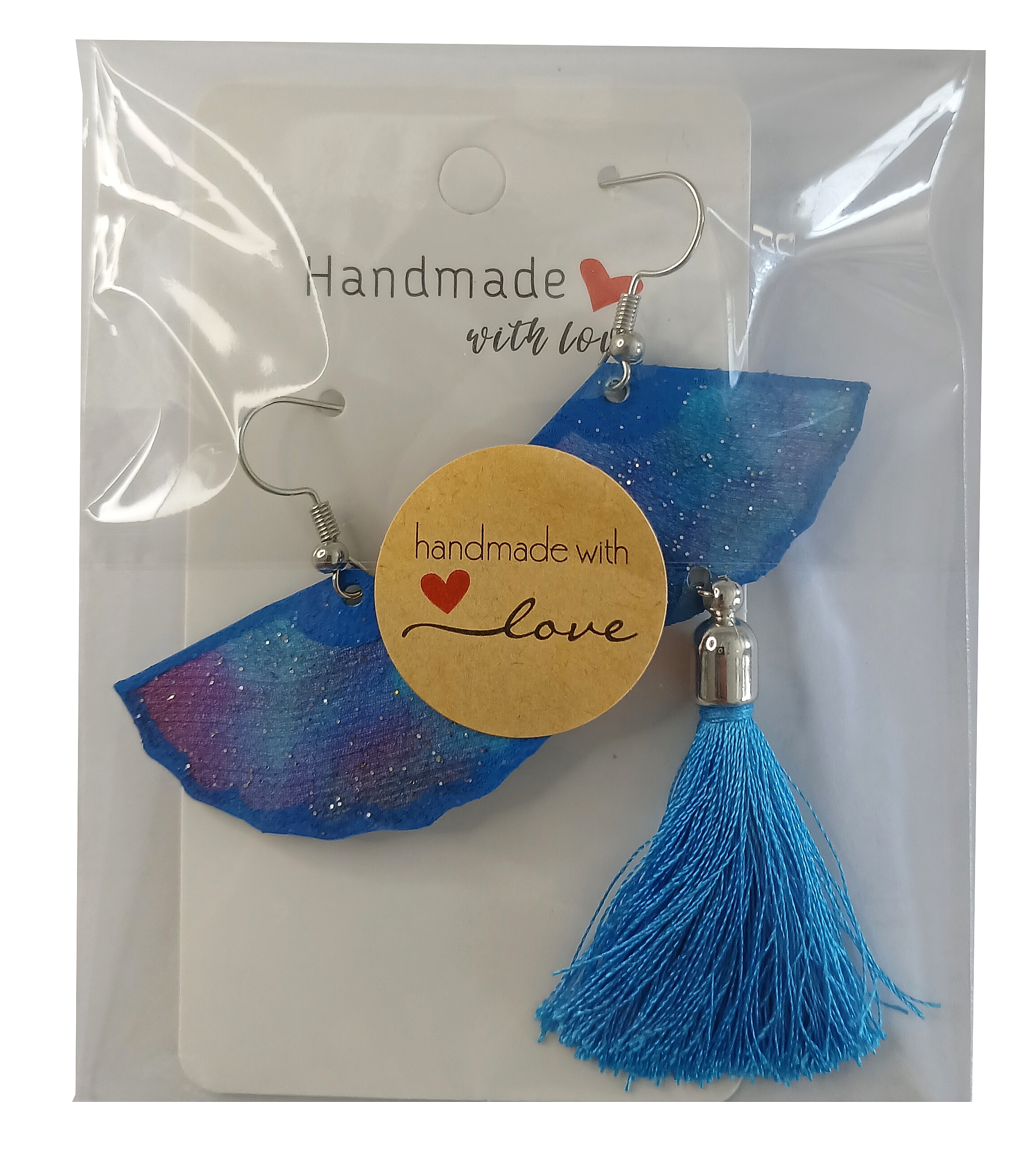 Boucles d oreilles en soie recto verso avec pompon.