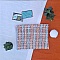 pochette femme en tissu tweed avec pompon amovible