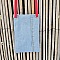 Pochette téléphone en jean recyclé avec bandoulière rouge.