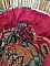 Intérieur d'une trousse bourse imperméable à motif floral bordeaux.