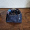 Vide poches en jean , doubl&eacute; de tissu coton imprim&eacute; wax.