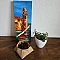Vide-poche trapèze en toile de jute sur table en bois.