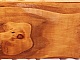 Porte-manteau mural rectangulaire en rondins de bois avec miroir.