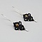 Boucles d'oreilles  en micro-macram&eacute; noires avec des perles en jaspe imp&eacute;rial