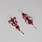 Boucles d'oreilles  en micro-macram&eacute; rouges et beiges avec perles en onyx noir