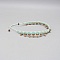 Bracelet de cheville en micro-macramé vert menthe à perles.