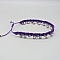 Bracelet de cheville en micro-macramé violet avec perles argentées.