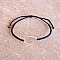 Bracelet  bleu fonc&eacute; en micro-macram&eacute; avec une goutte en argent