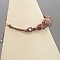Bracelet en micro-macram&eacute; couleur taupe avec une perle en verre