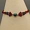 Bracelet micro-macramé marron avec perles chrysocolle et acier doré.