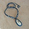 Collier en micro-macramé bleu canard avec pierre jaspe larsonite.