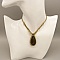 Collier  micro-macram&eacute; dor&eacute; avec une  obsidienne dor&eacute;e 