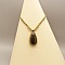 Collier  micro-macram&eacute; dor&eacute; avec une  obsidienne dor&eacute;e 