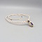 Collier en micro-macram&eacute; ras-du-cou avec des am&eacute;thystes serties 