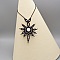 collier noir en micro-macram&eacute; avec une pierre de lune sertie