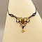 Collier noir en micro-macram&eacute;  avec un oeil de tigre serti