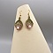 Paire de boucles d'oreilles bleues avec des perles en rhodochrosite