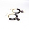 Paire de boucles d'oreilles cr&eacute;oles dans les tons noir et violet en micro-macram&eacute;