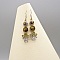 Paire de boucles d'oreilles  en micro-macram&eacute; dor&eacute;es 