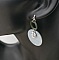 Boucles d'oreilles graphiques en bois gris et vert feuilles monstera