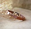Bracelet en cuir femme rose poudr&eacute; et tiss&eacute;