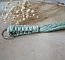 Porte-clés en macramé vert sauge en corde de coton.