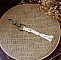 Porte-clés macramé en coton avec perle bois et mousqueton laiton.