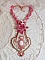 Plastron Lys Rose brod&eacute; avec une pierre de gemme l'Howlite blanc, rocailles, dentelle et perles diverses fa&ccedil;on Haute-Couture